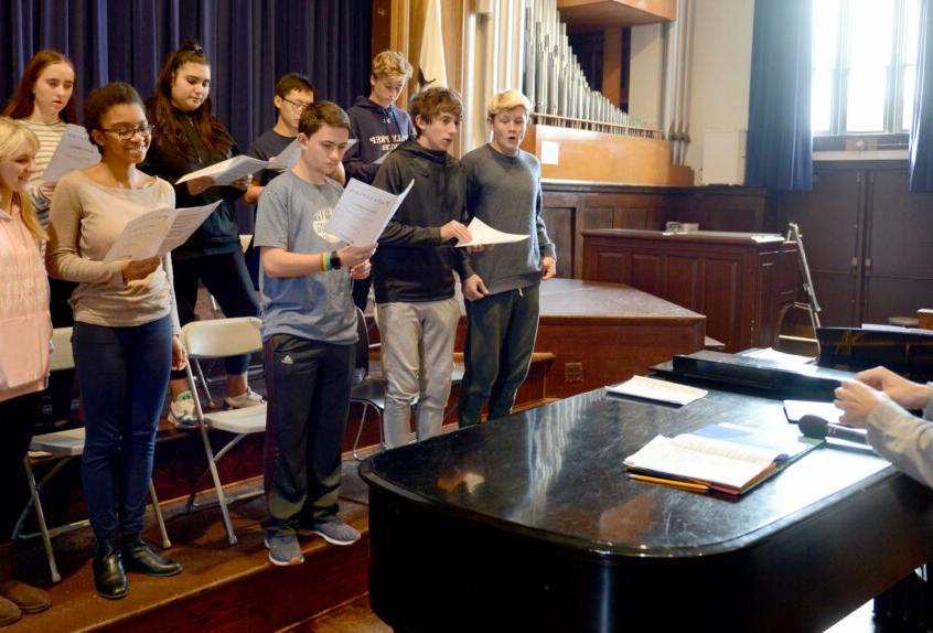 Dan Doughty teaching music class in chapel